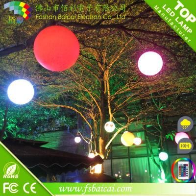 Christmas and Holiday Decorative LED Illumiated Balls Hanging on Tree